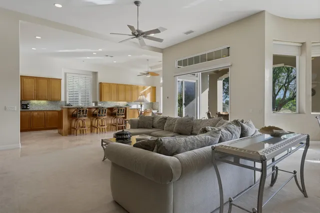 a kitchen with granite countertop a sink and a counter top space