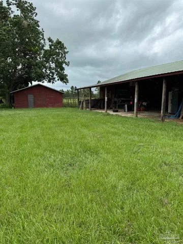 a fire hydrant in the middle of a field