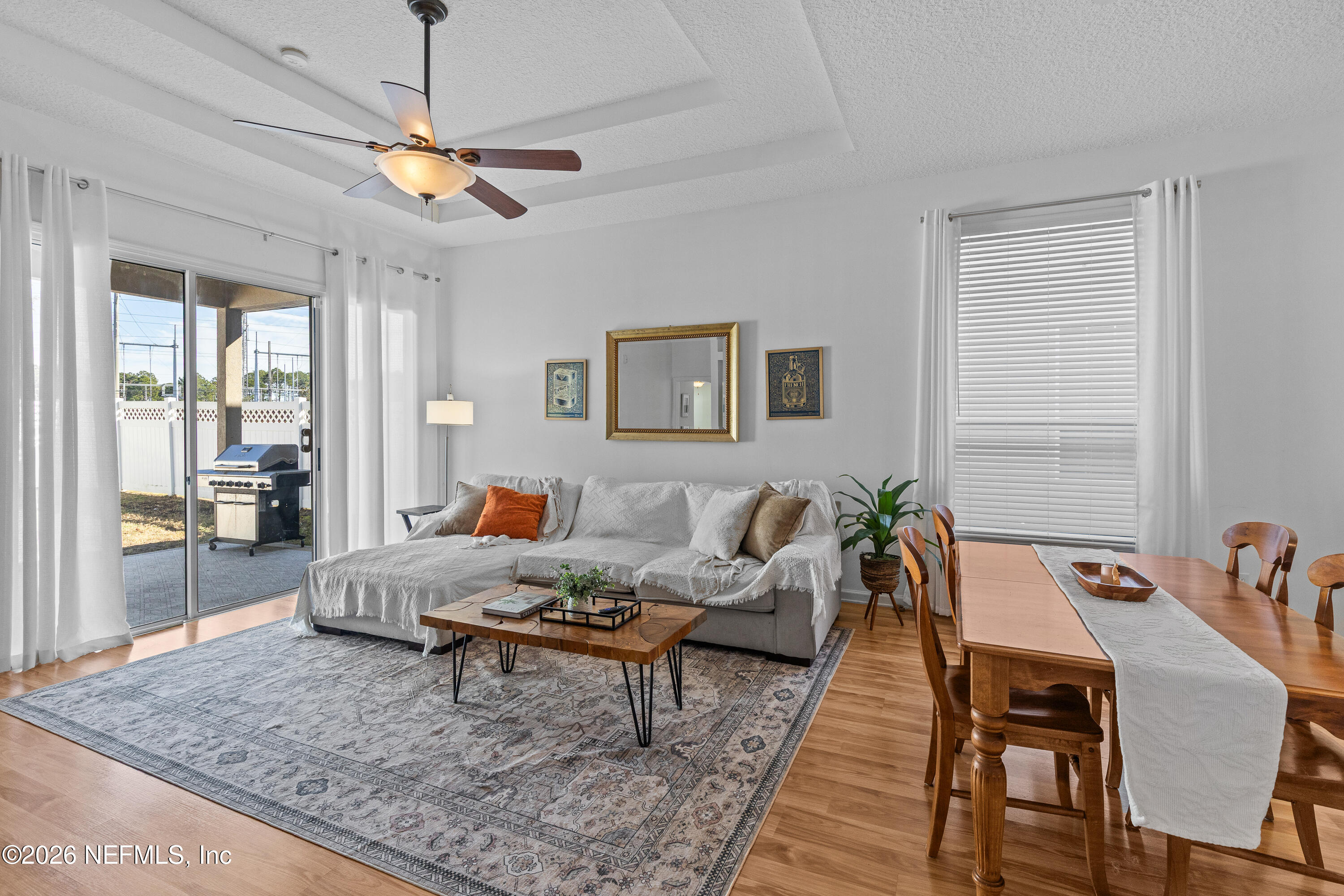 827 Briarcreek Road Jacksonville, FL 32225 - Photo 15 of 44 a living room with furniture and a table