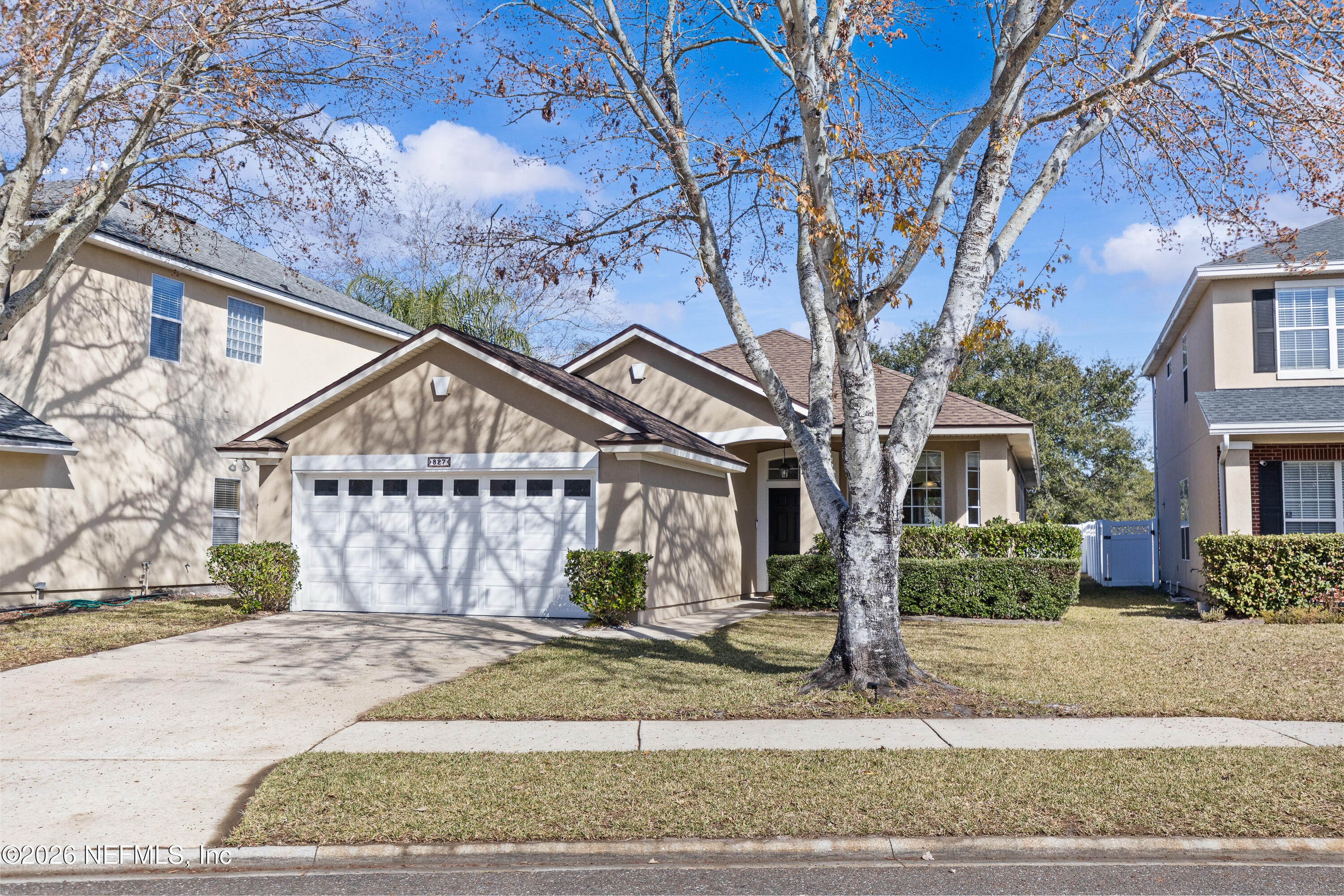 827 Briarcreek Road Jacksonville, FL 32225 - Photo 3 of 44 front view of a house with a dry yard