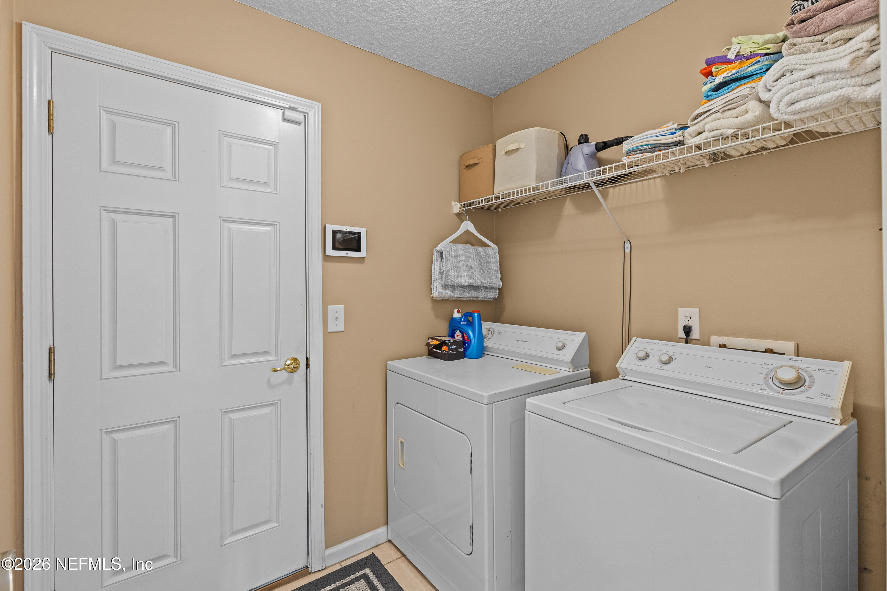 827 Briarcreek Road Jacksonville, FL 32225 - Photo 32 of 44 a utility room with dryer and washer