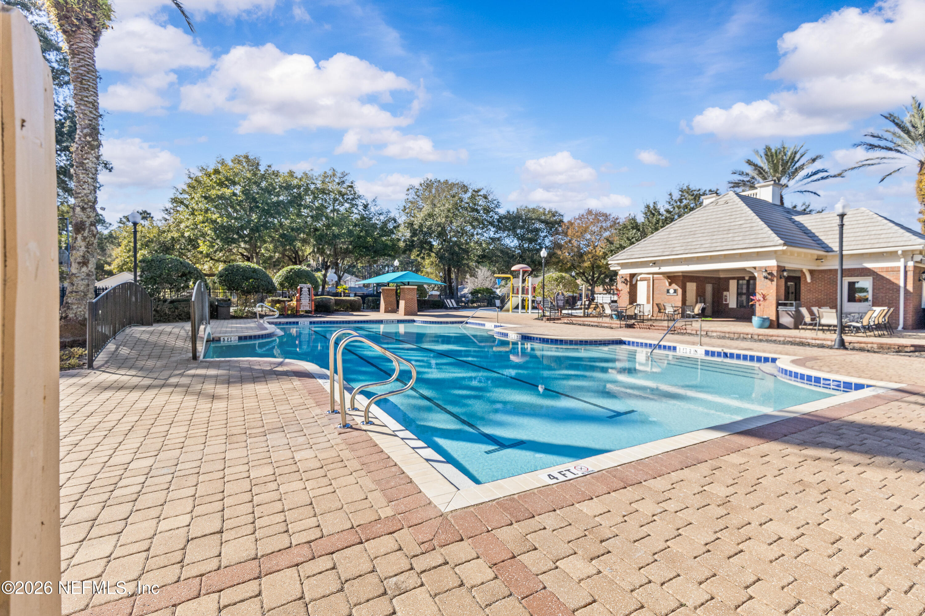827 Briarcreek Road Jacksonville, FL 32225 - Photo 41 of 44 a view of a chairs and tables in the patio