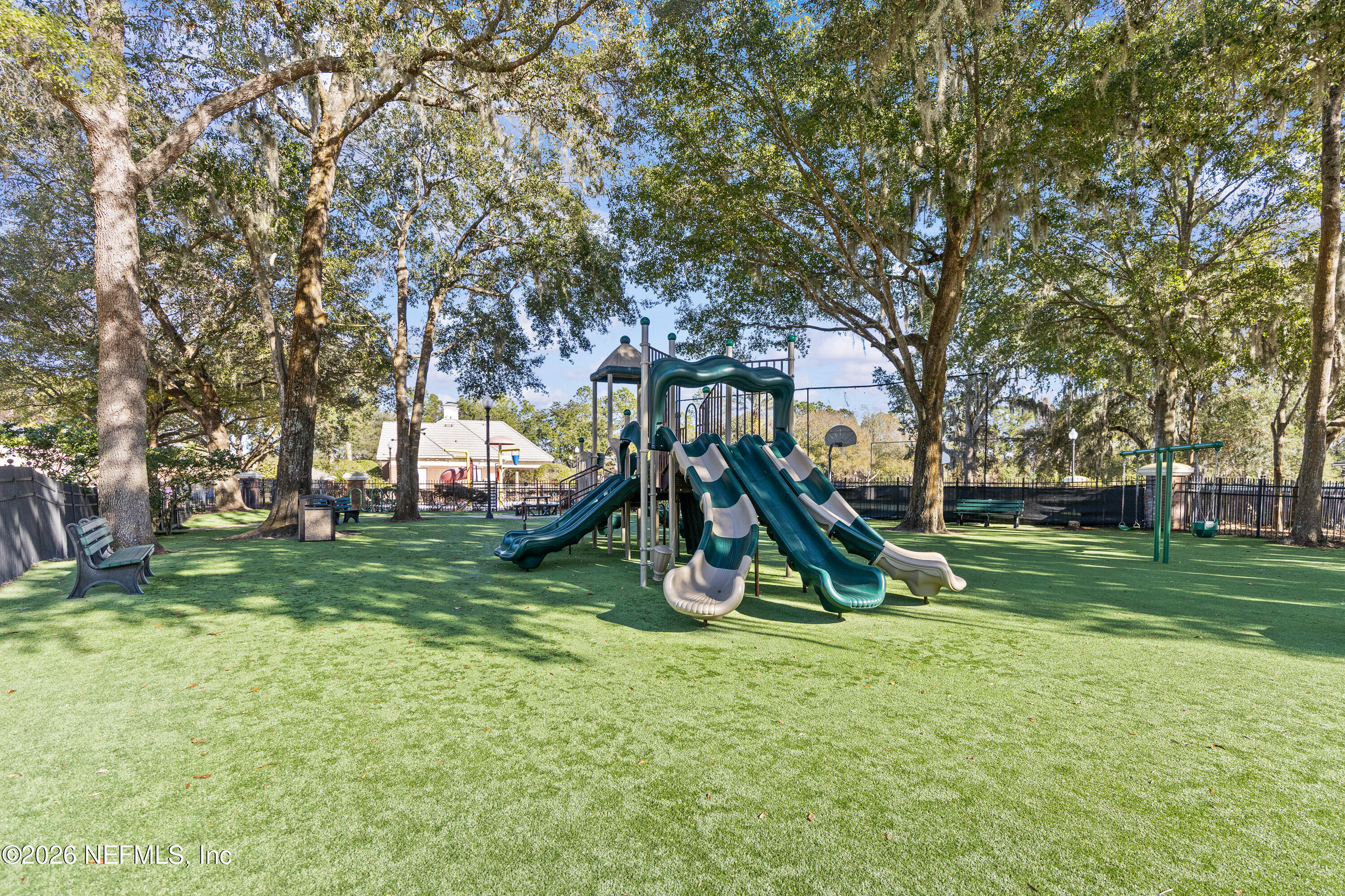 827 Briarcreek Road Jacksonville, FL 32225 - Photo 43 of 44 a view of a park with a slide