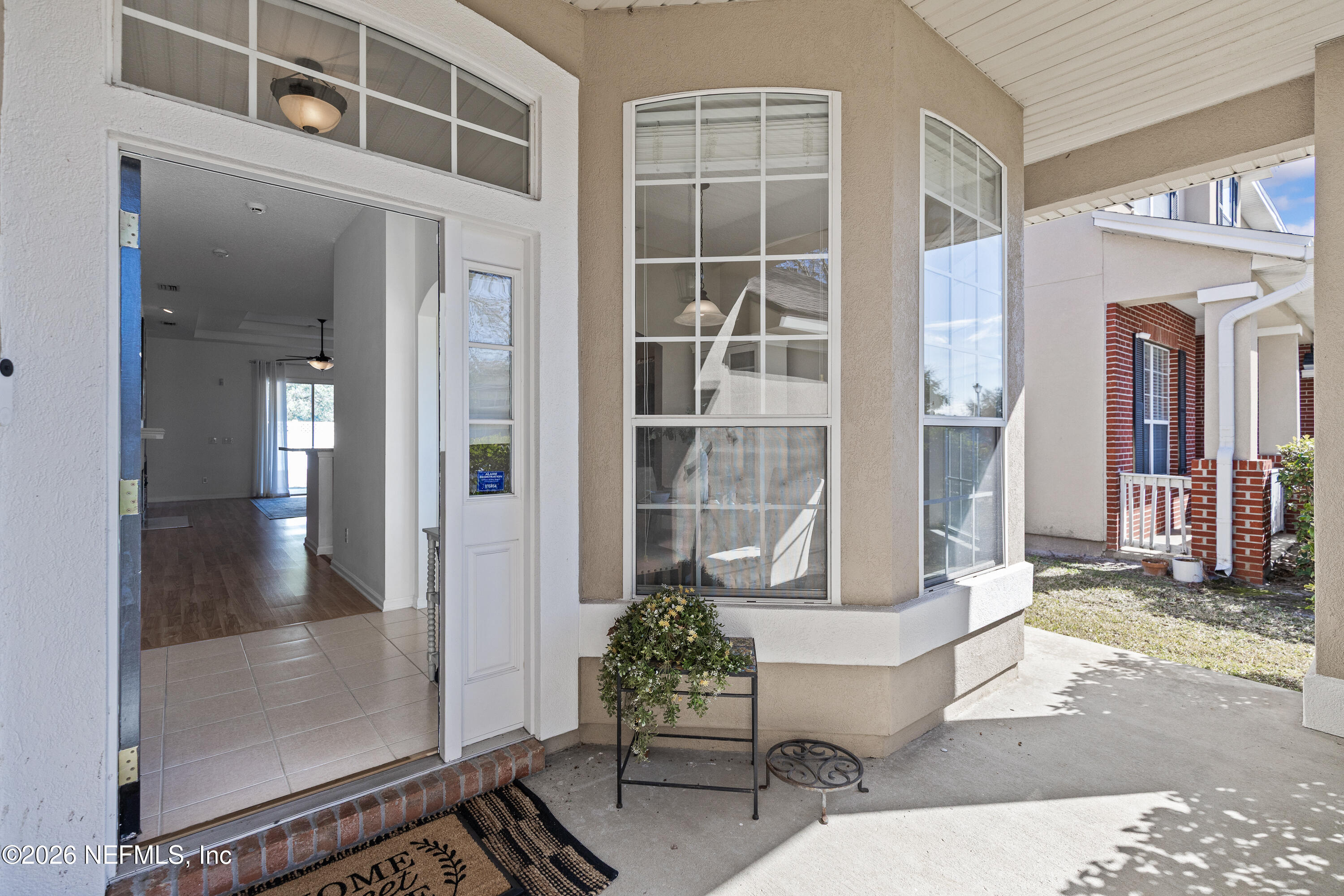 827 Briarcreek Road Jacksonville, FL 32225 - Photo 6 of 44 a living room with furniture and windows