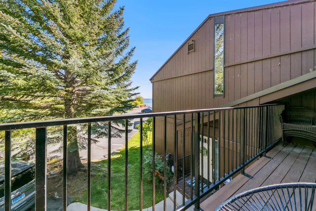 a view of balcony with furniture