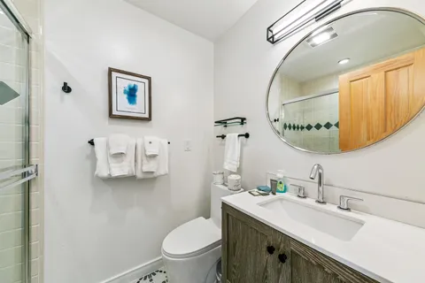 a view of a balcony with wooden floor