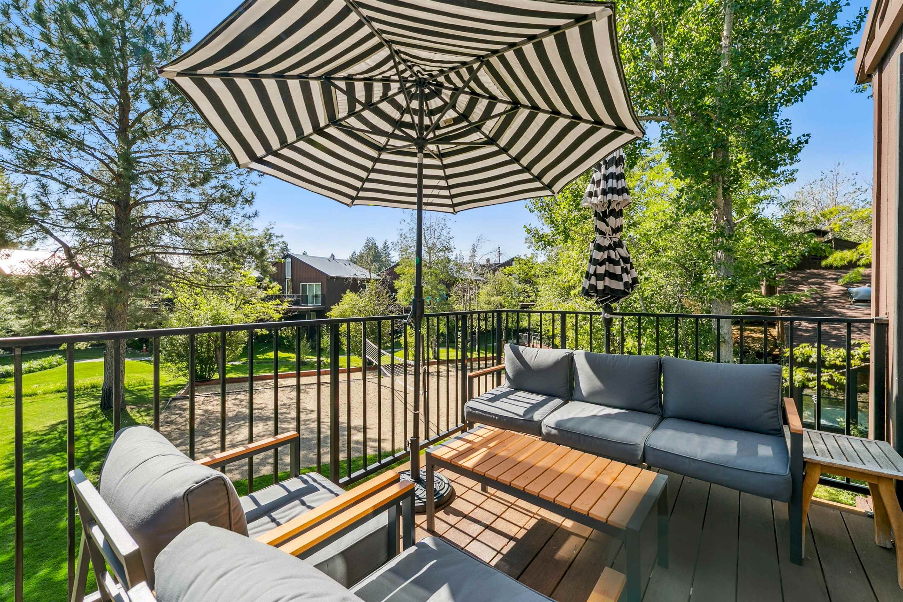 2560 Lake Forest Road, Unit 24 Tahoe City, CA 96145 - Photo 19 of 28 a roof deck with couches and wooden floor