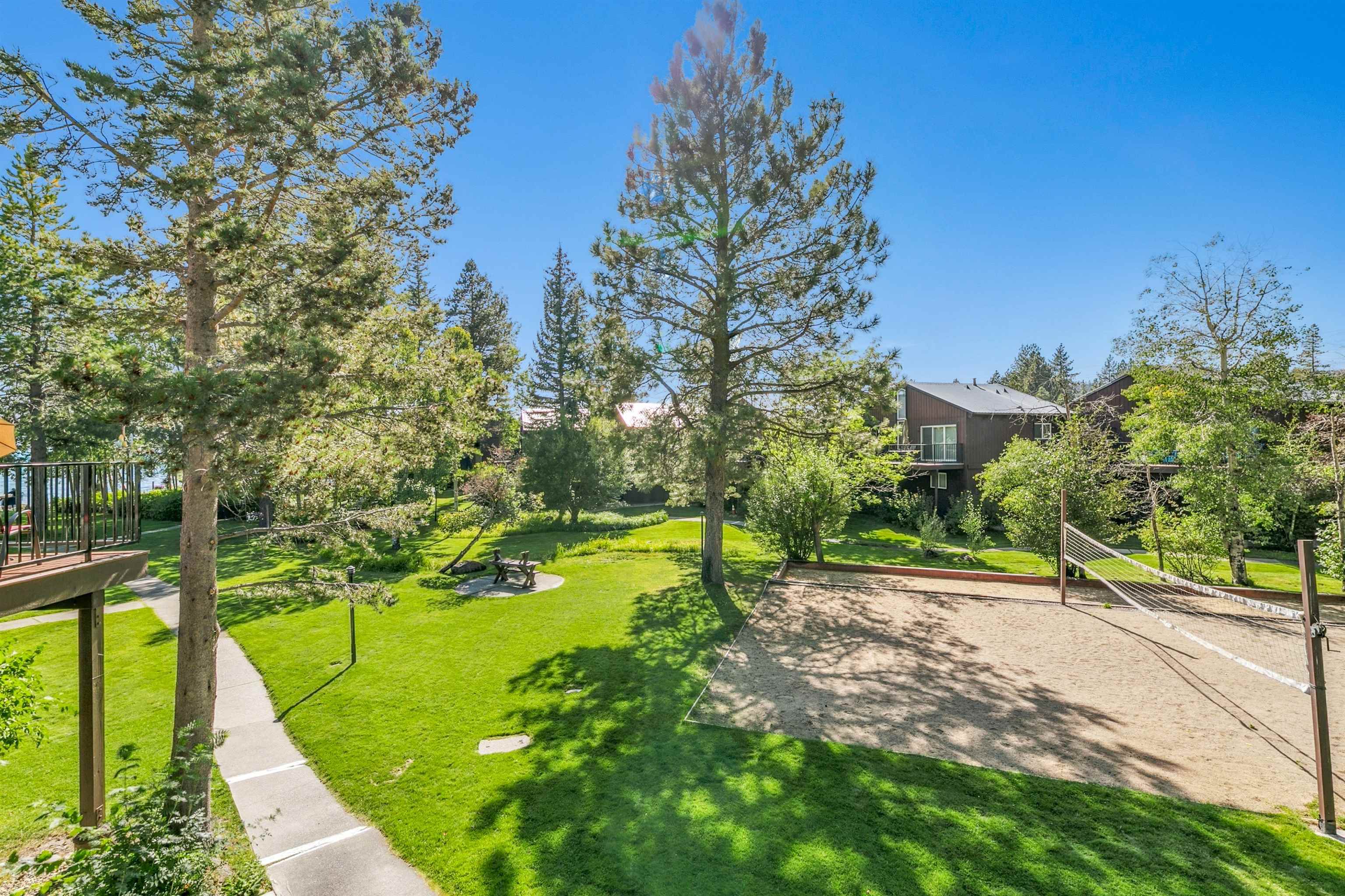 2560 Lake Forest Road, Unit 24 Tahoe City, CA 96145 - Photo 21 of 28 a view of a yard with an trees