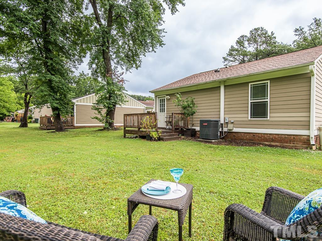 1312 South State Street, Unit D Raleigh, NC 27610 - Photo 16 of 19 a view of an house with backyard space and sitting area