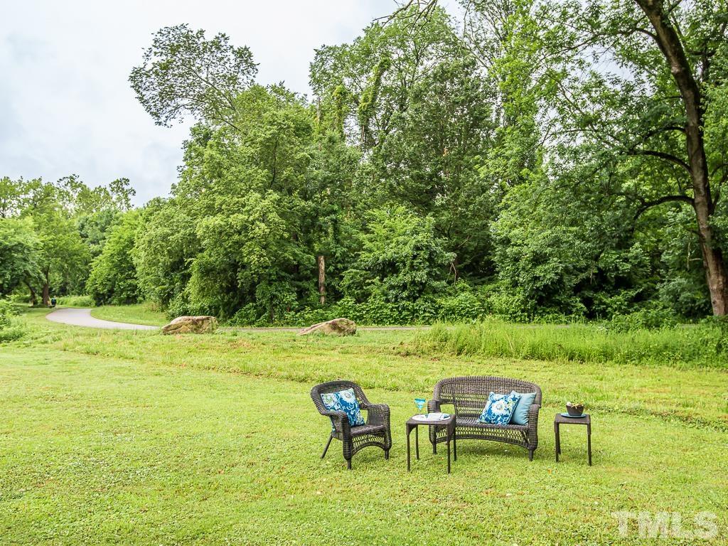 1312 South State Street, Unit D Raleigh, NC 27610 - Photo 17 of 19 a view of an ocean from a balcony with seating space