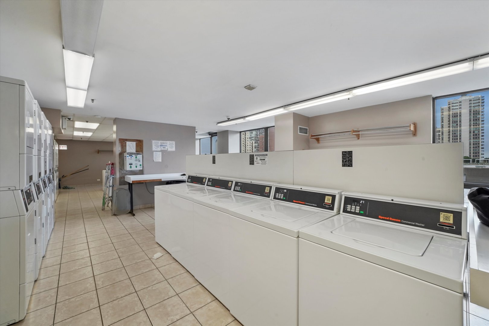 1122 North Clark Street, Unit 2202 Chicago, IL 60610 - Photo 12 of 12 a kitchen with a sink and cabinets