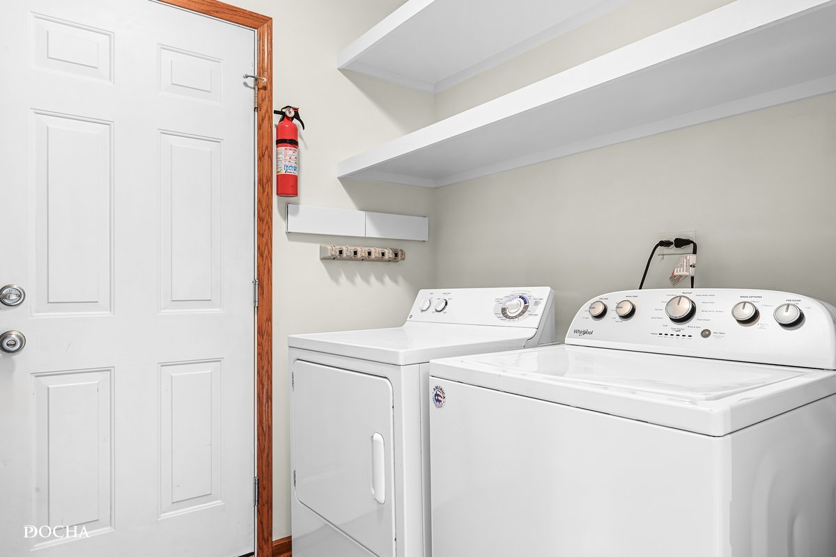 2413 Roxbury Lane Montgomery, IL 60538 - Photo 11 of 22 a utility room with dryer and washer