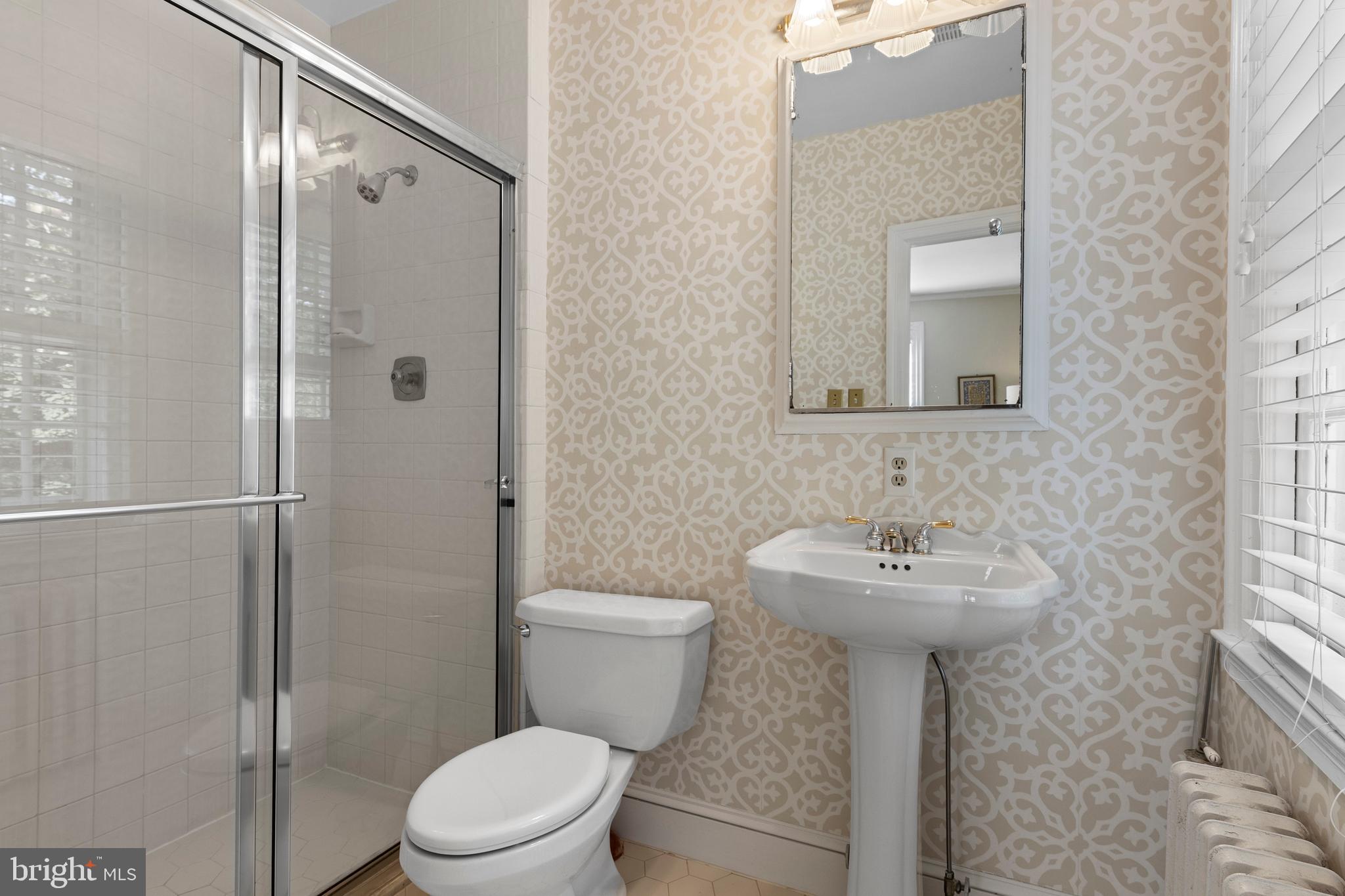 103 Ashwood Road Villanova, PA 19085 - Photo 54 of 75 a bathroom with a sink toilet and shower