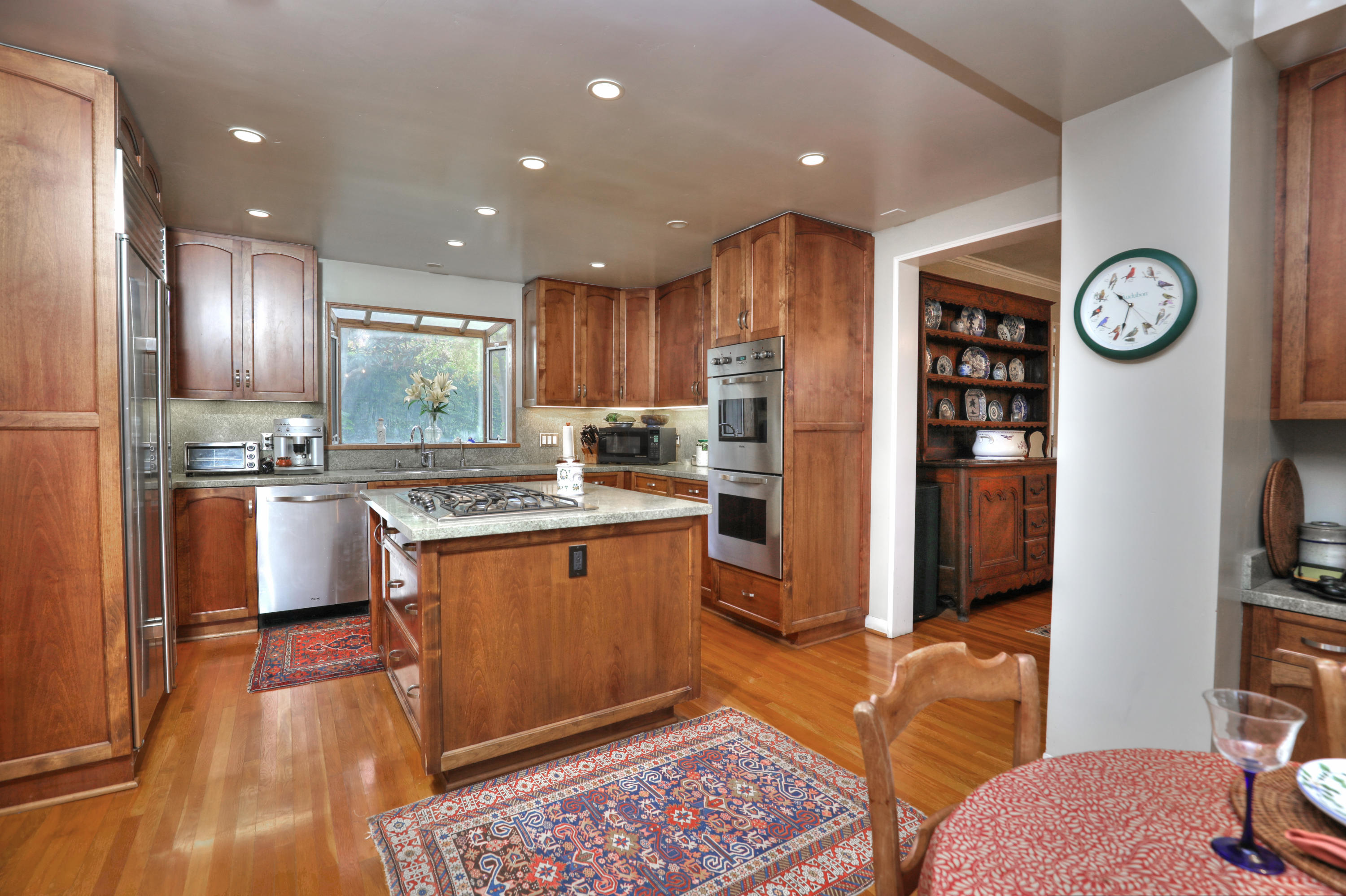 189 Hermosillo Road Montecito, CA 93108 - Photo 13 of 23 a kitchen with stainless steel appliances granite countertop a refrigerator and a stove top oven
