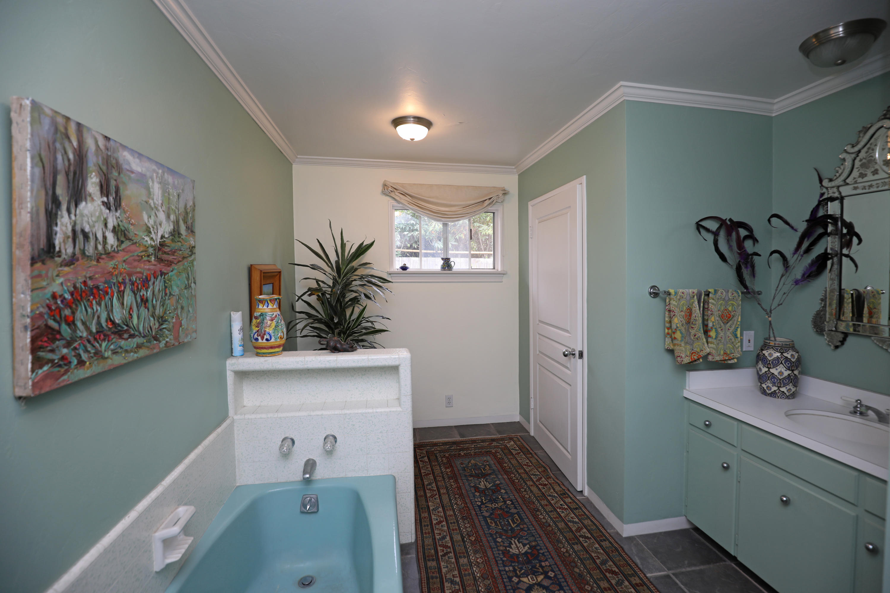 189 Hermosillo Road Montecito, CA 93108 - Photo 15 of 23 a bathroom with a sink a mirror and a shower