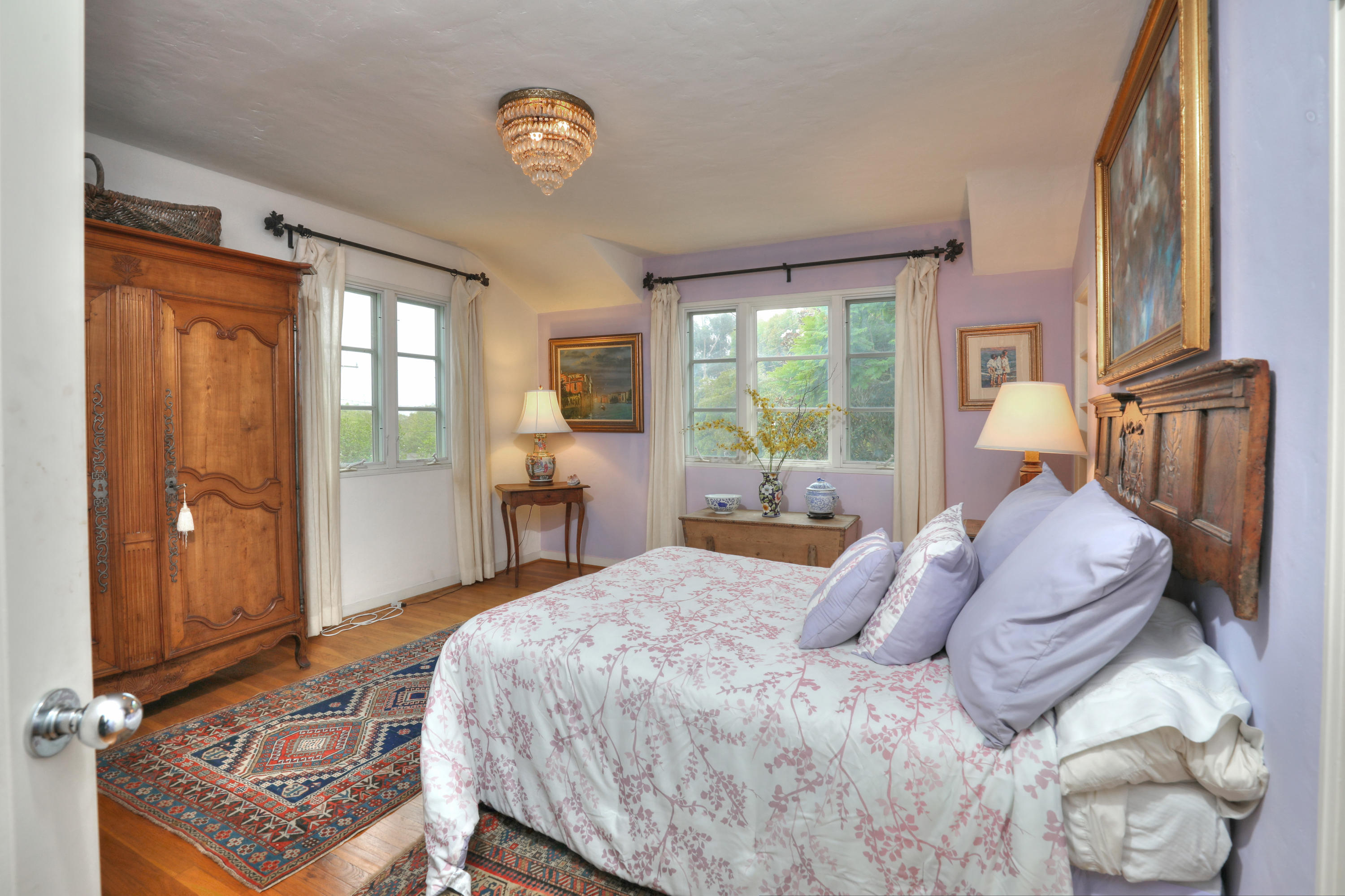 189 Hermosillo Road Montecito, CA 93108 - Photo 20 of 23 a bed room with a bed and a lamp