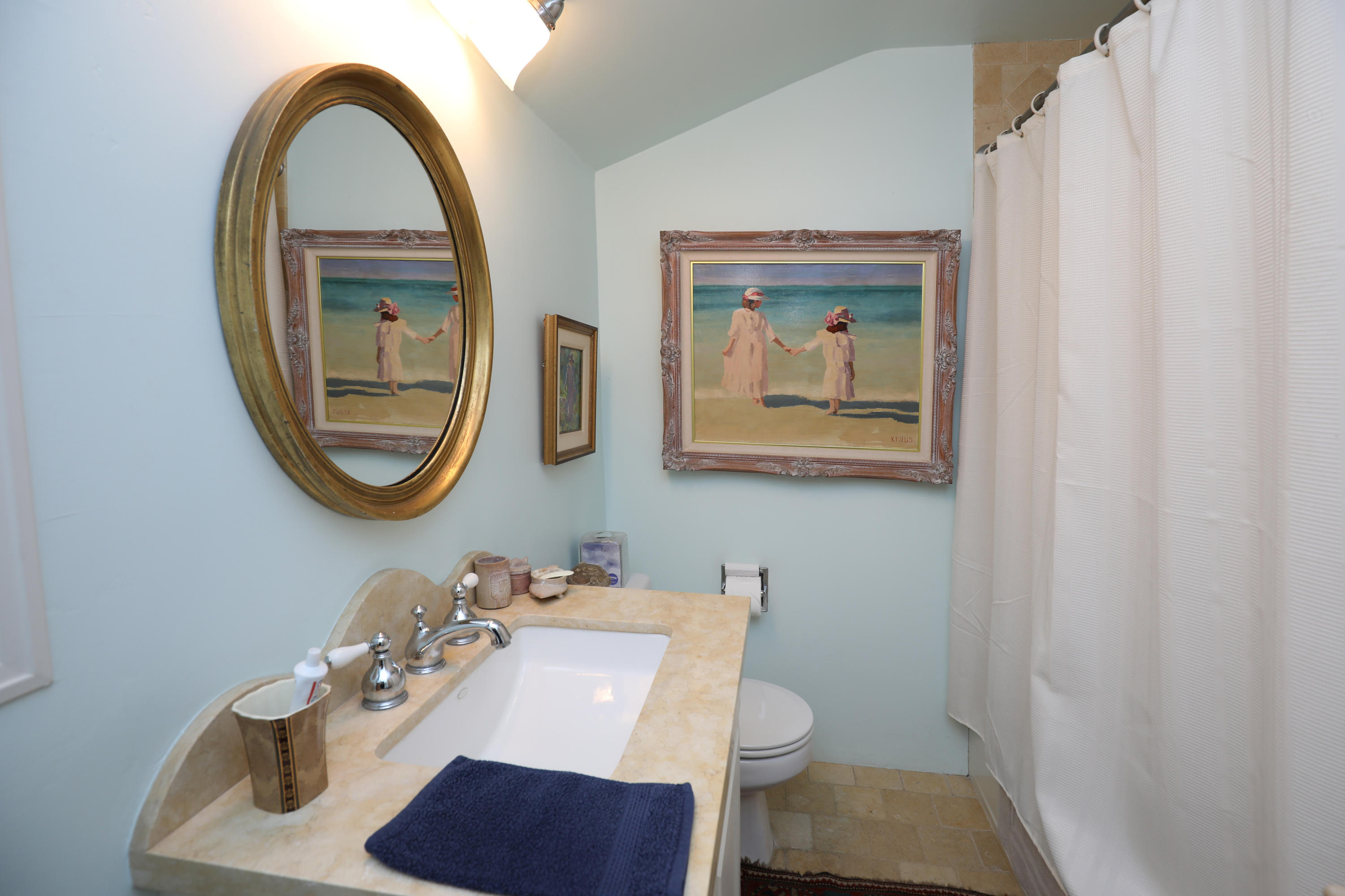 189 Hermosillo Road Montecito, CA 93108 - Photo 21 of 23 a bathroom with a toilet a sink and a mirror