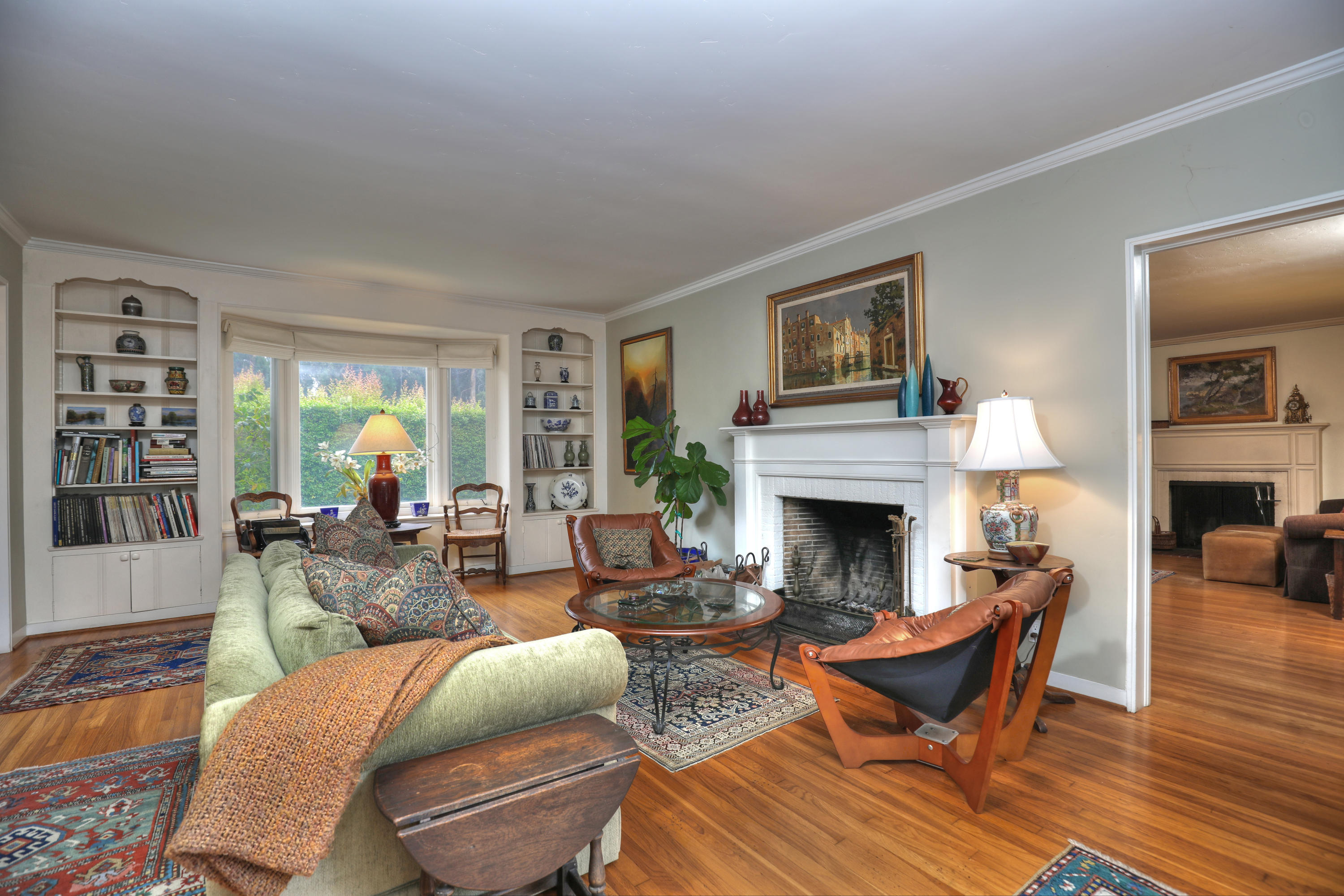 189 Hermosillo Road Montecito, CA 93108 - Photo 5 of 23 a living room with furniture a fireplace and a window