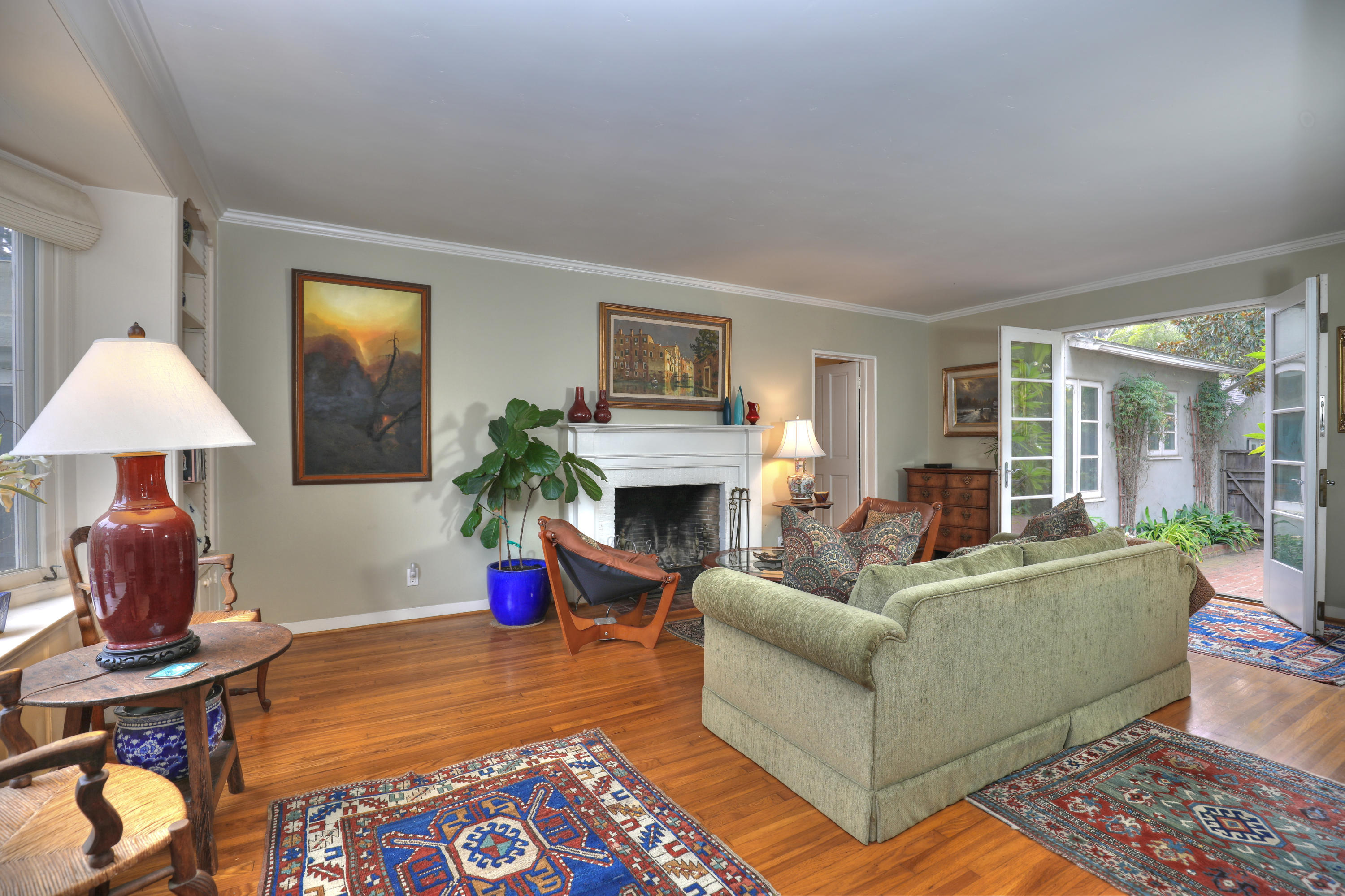 189 Hermosillo Road Montecito, CA 93108 - Photo 6 of 23 a living room with furniture and a fireplace
