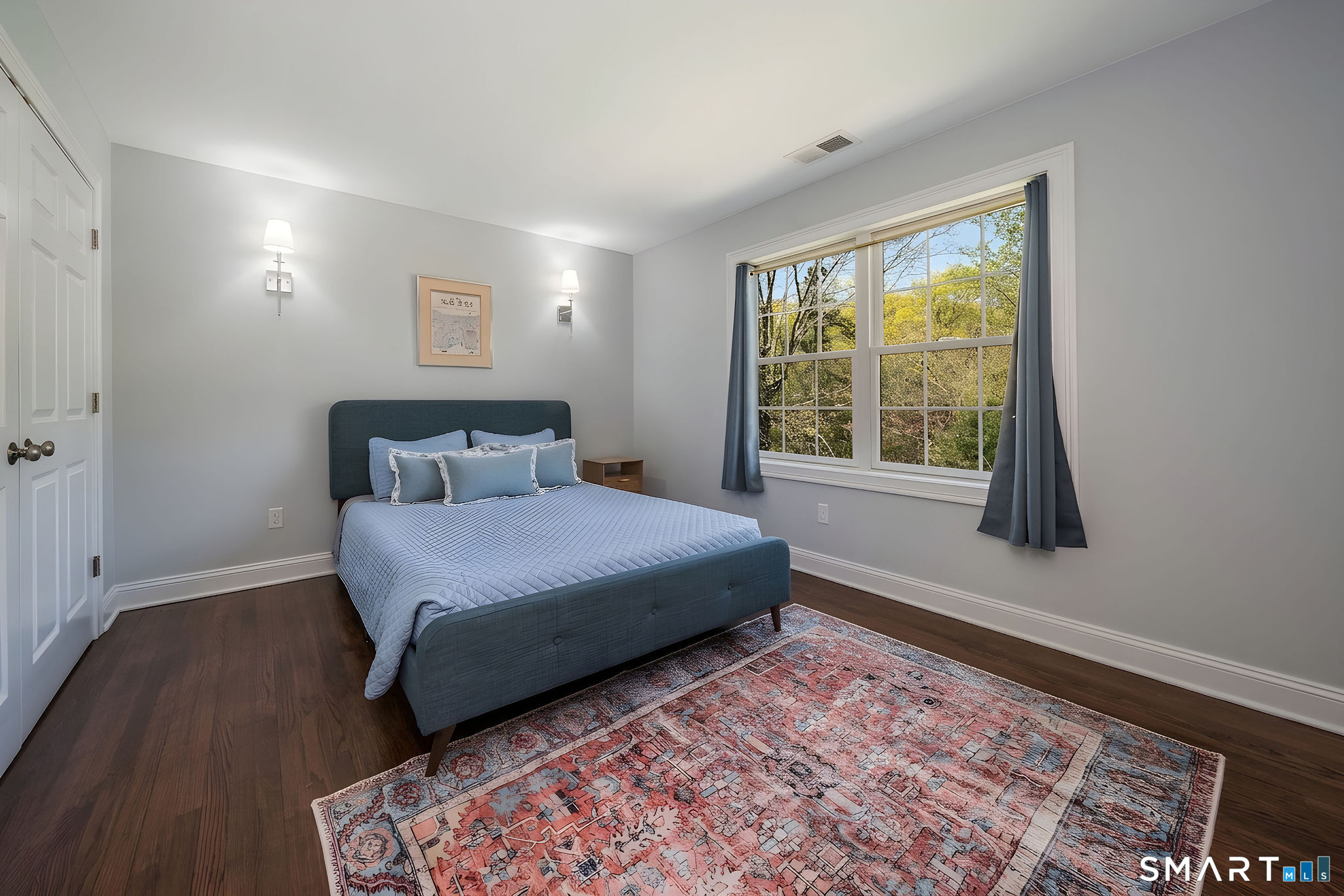 9 Sunset Ridge Drive Guilford, CT 06437 - Photo 23 of 40 a bedroom with a bed and a window