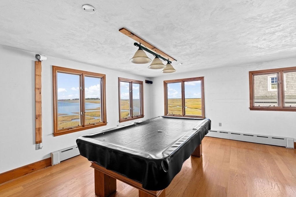 26 Damons Point Circle Marshfield, MA 02050 - Photo 15 of 35 a living room with pool table and a window