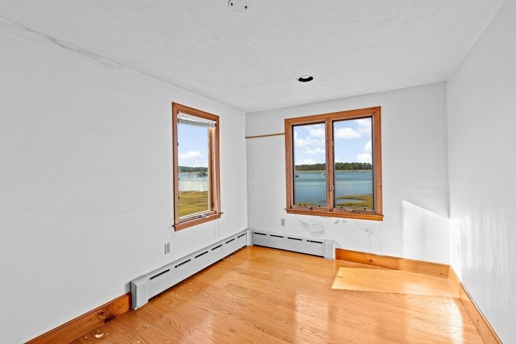 26 Damons Point Circle Marshfield, MA 02050 - Photo 19 of 35 an empty room with a window