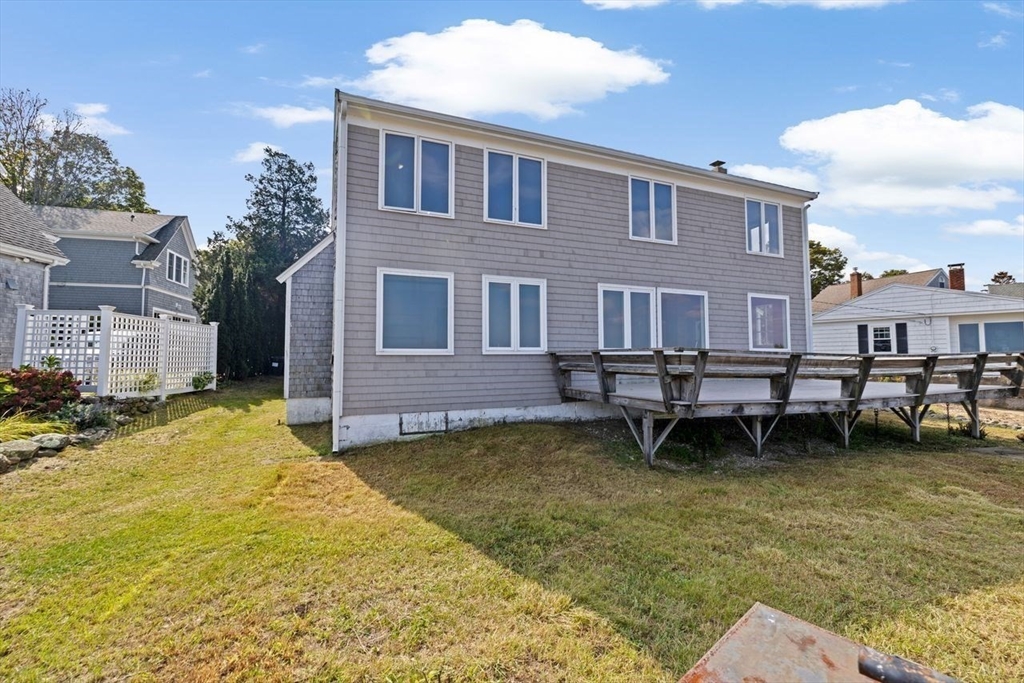 26 Damons Point Circle Marshfield, MA 02050 - Photo 20 of 35 a swimming pool with outdoor seating and yard