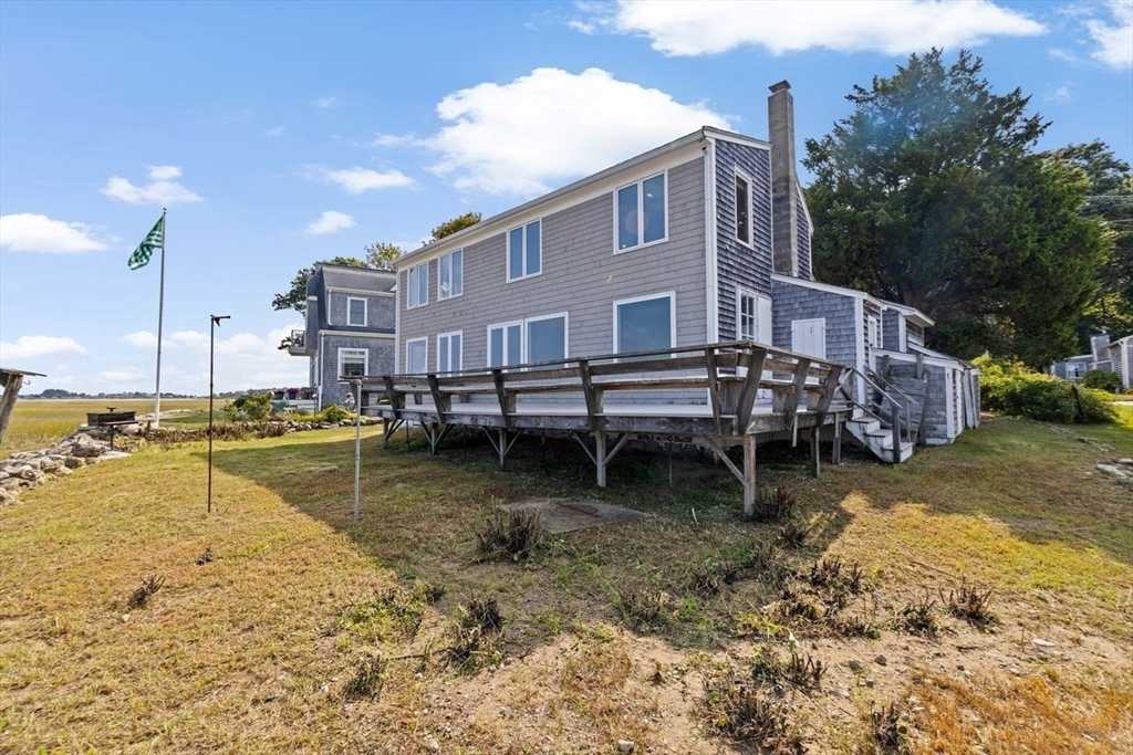 26 Damons Point Circle Marshfield, MA 02050 - Photo 21 of 35 a view of a swimming pool with a lounge chairs