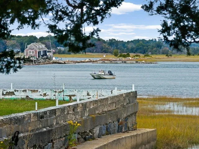 a view of a lake with building in front of it
