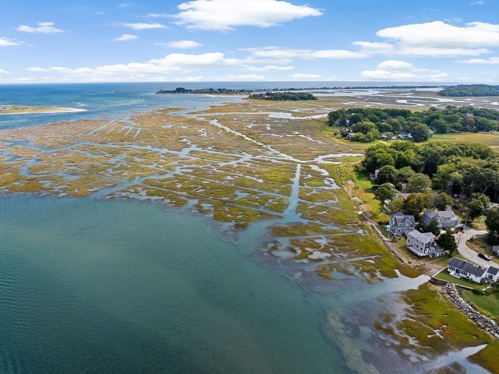 26 Damons Point Circle Marshfield, MA 02050 - Photo 32 of 35 a view of an ocean and beach