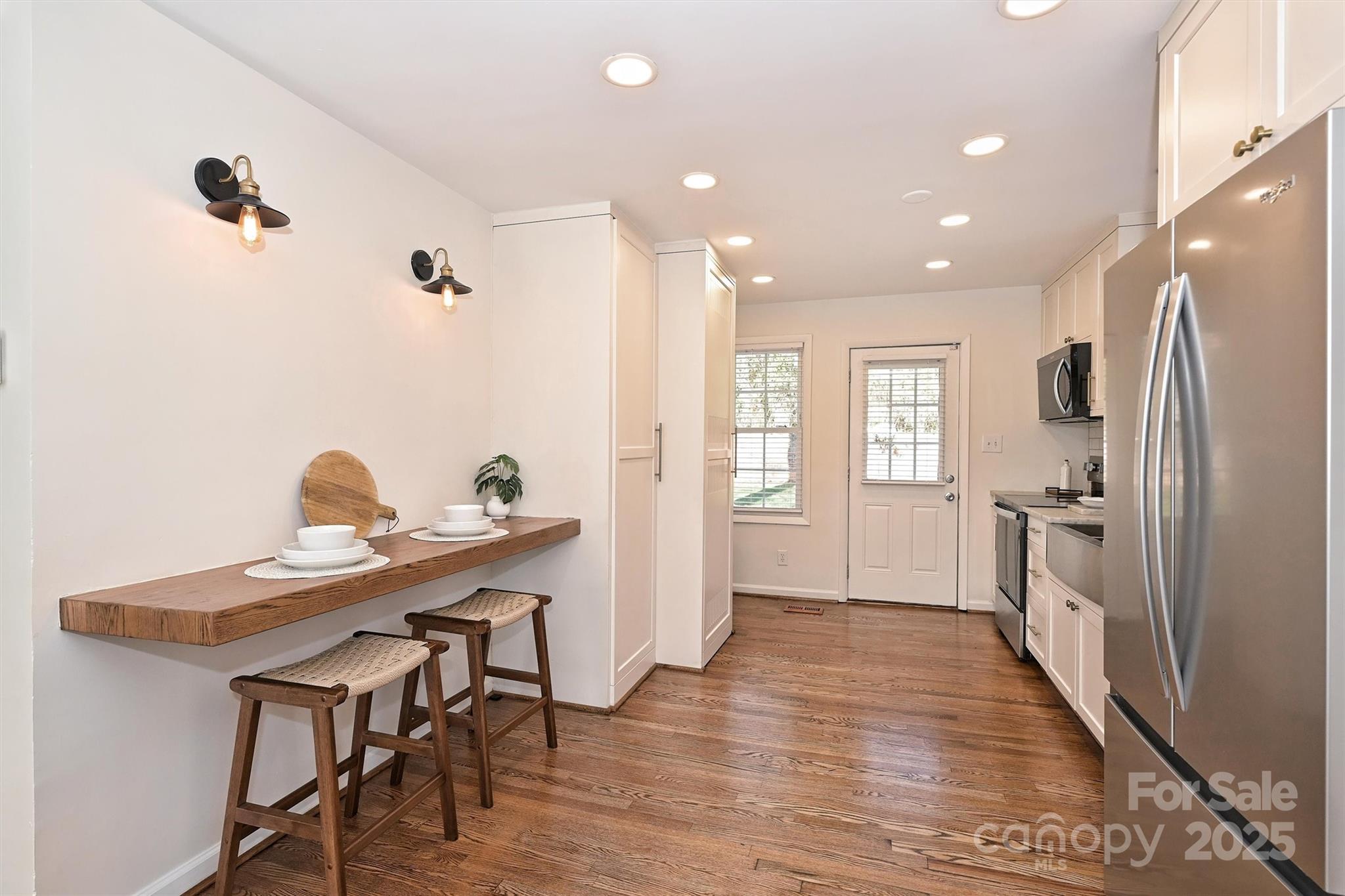 2730 Royston Road Charlotte, NC 28208 - Photo 15 of 40 a kitchen with a table and chairs in it