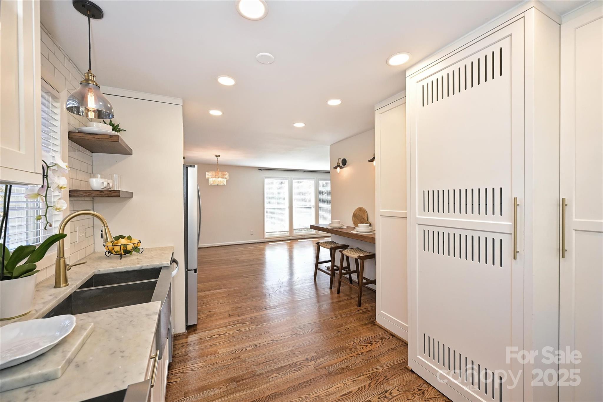 2730 Royston Road Charlotte, NC 28208 - Photo 16 of 40 a dining room with furniture and wooden floor