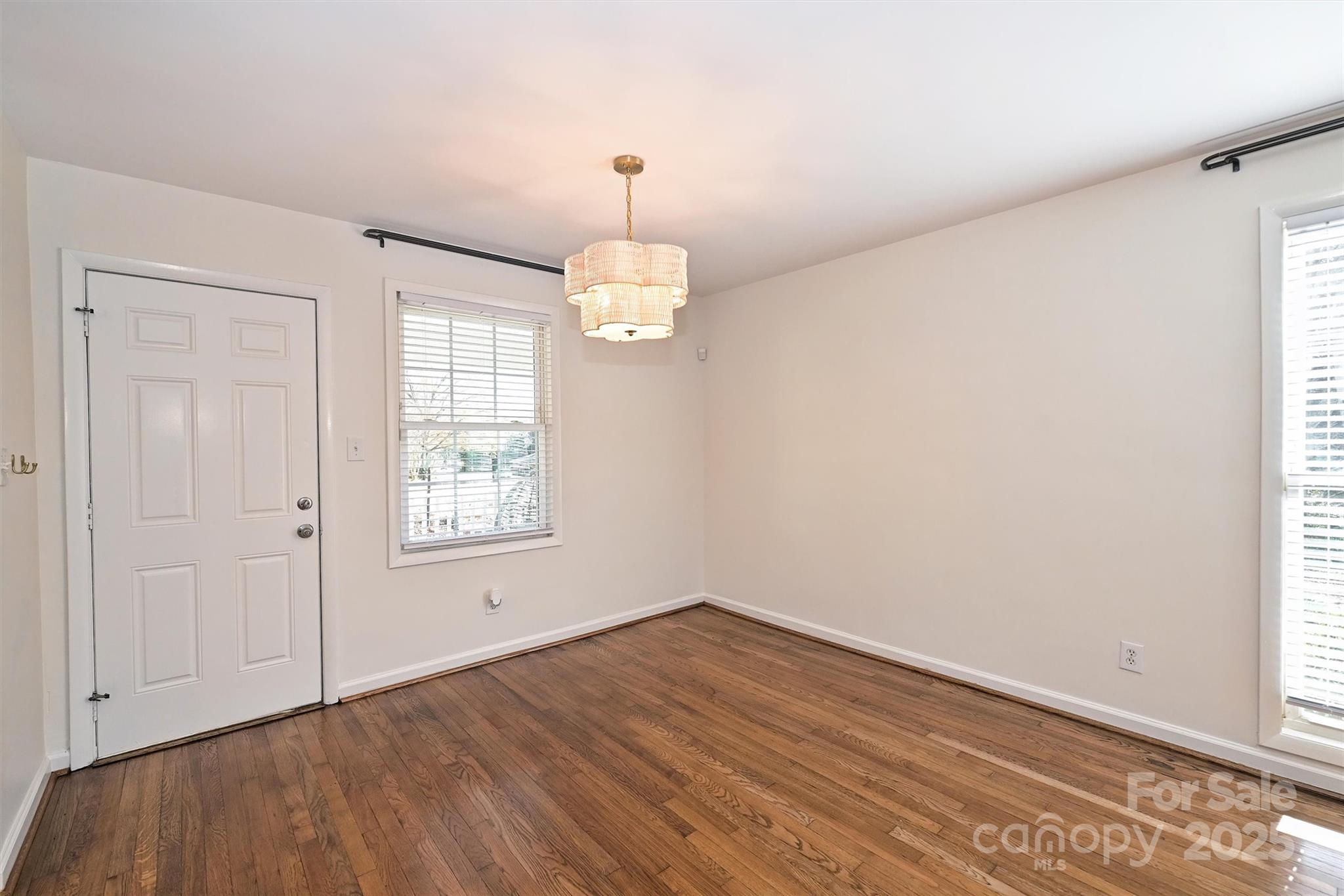 2730 Royston Road Charlotte, NC 28208 - Photo 19 of 40 wooden floor in an empty room with a window