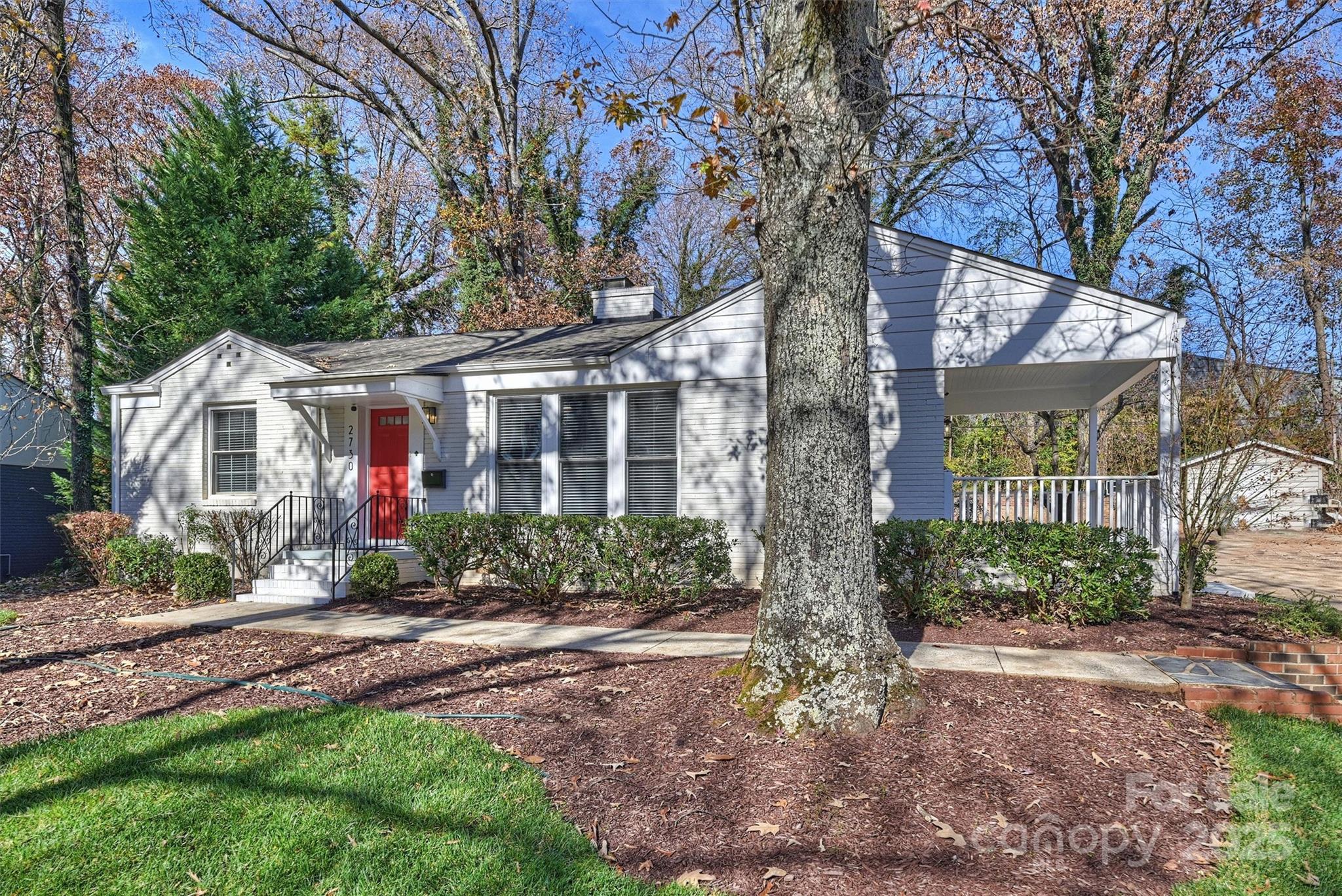 2730 Royston Road Charlotte, NC 28208 - Photo 2 of 40 a front view of a house with garden