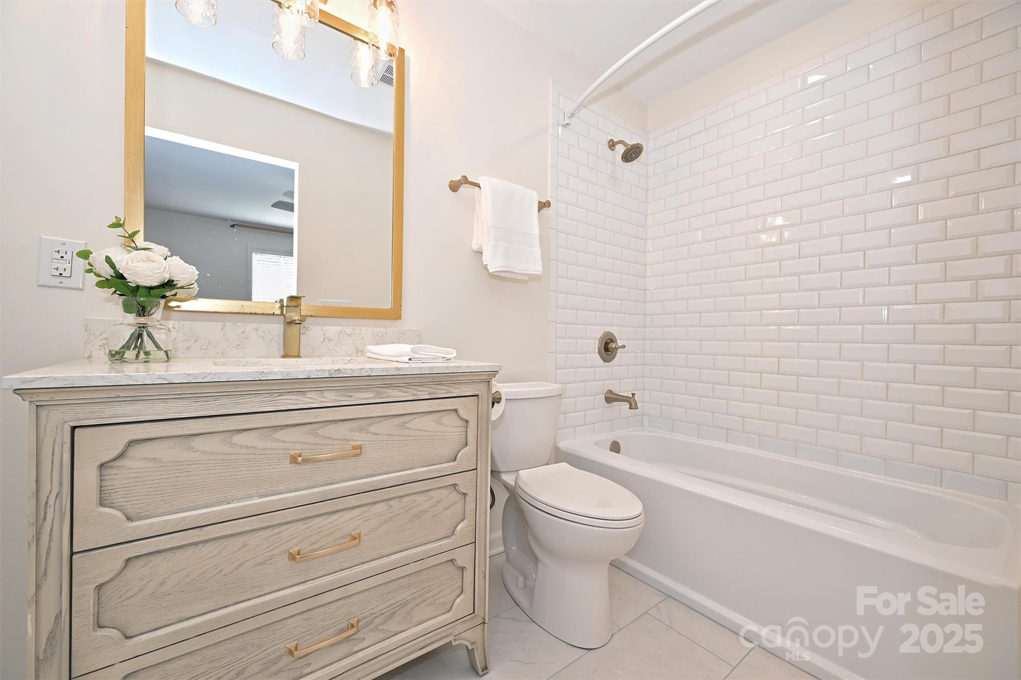 2730 Royston Road Charlotte, NC 28208 - Photo 23 of 40 a bathroom with a sink a toilet and bathtub