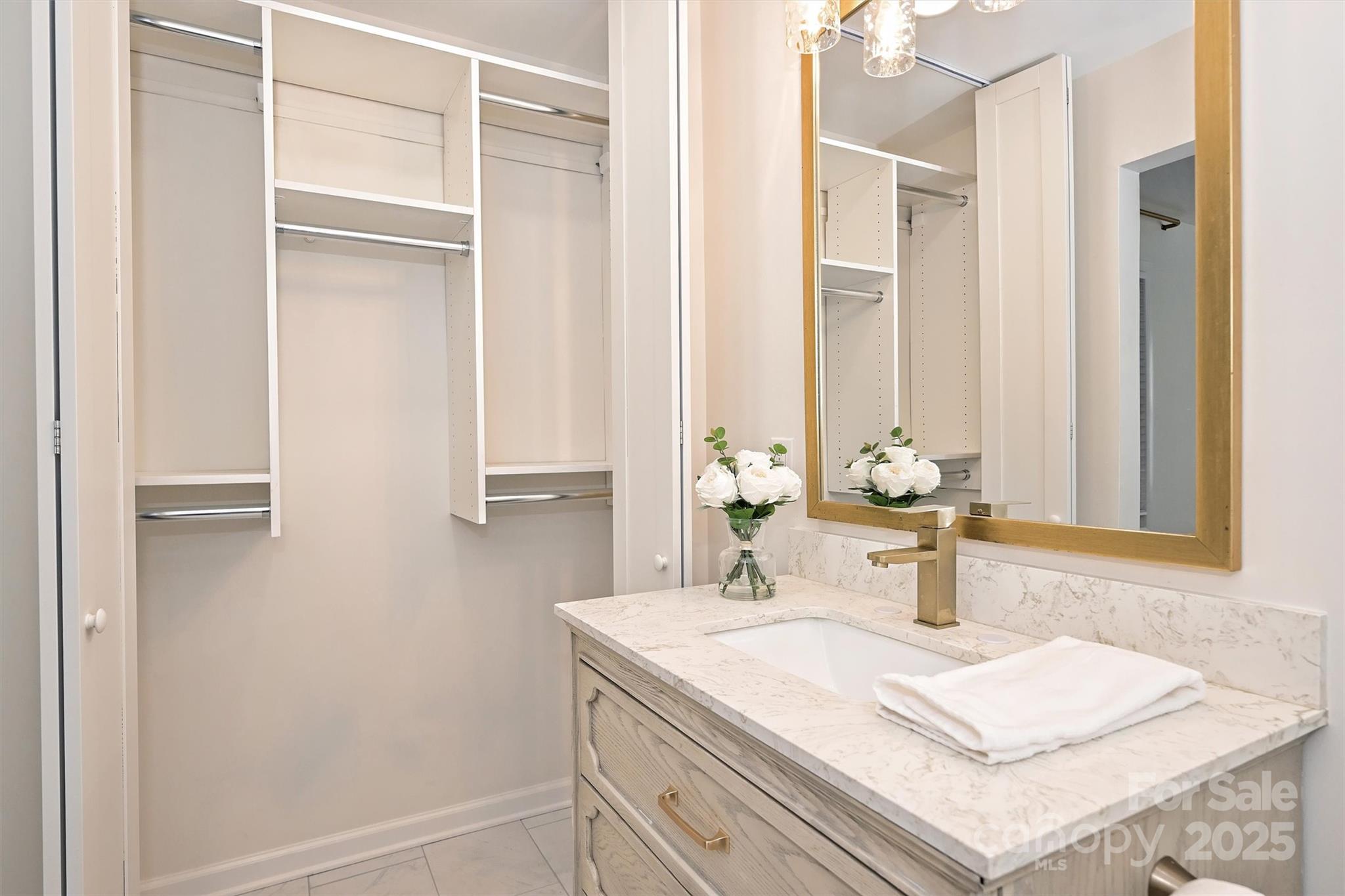 2730 Royston Road Charlotte, NC 28208 - Photo 24 of 40 a bathroom with a sink and a mirror