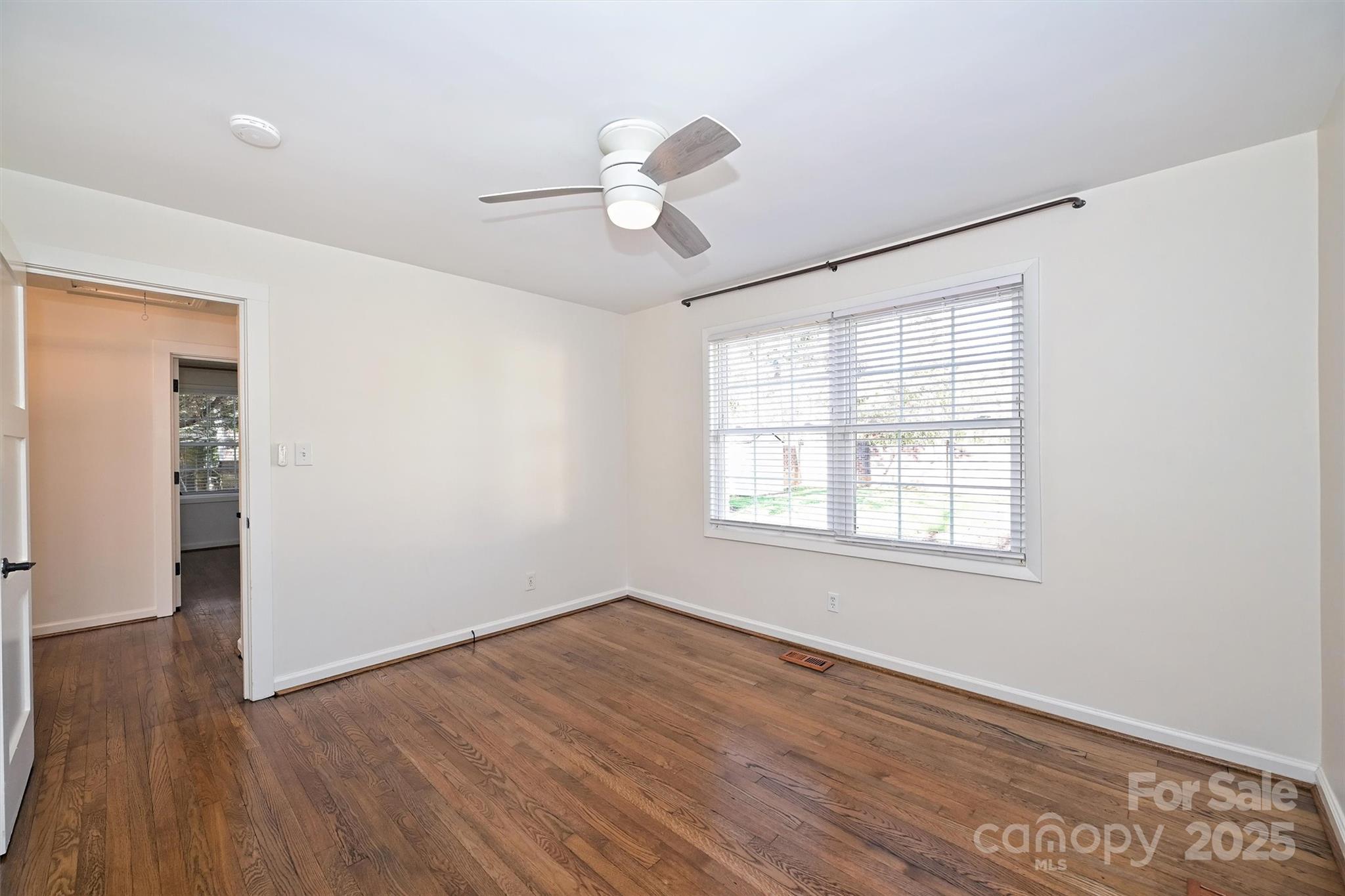 2730 Royston Road Charlotte, NC 28208 - Photo 26 of 40 wooden floor in an empty room with a window