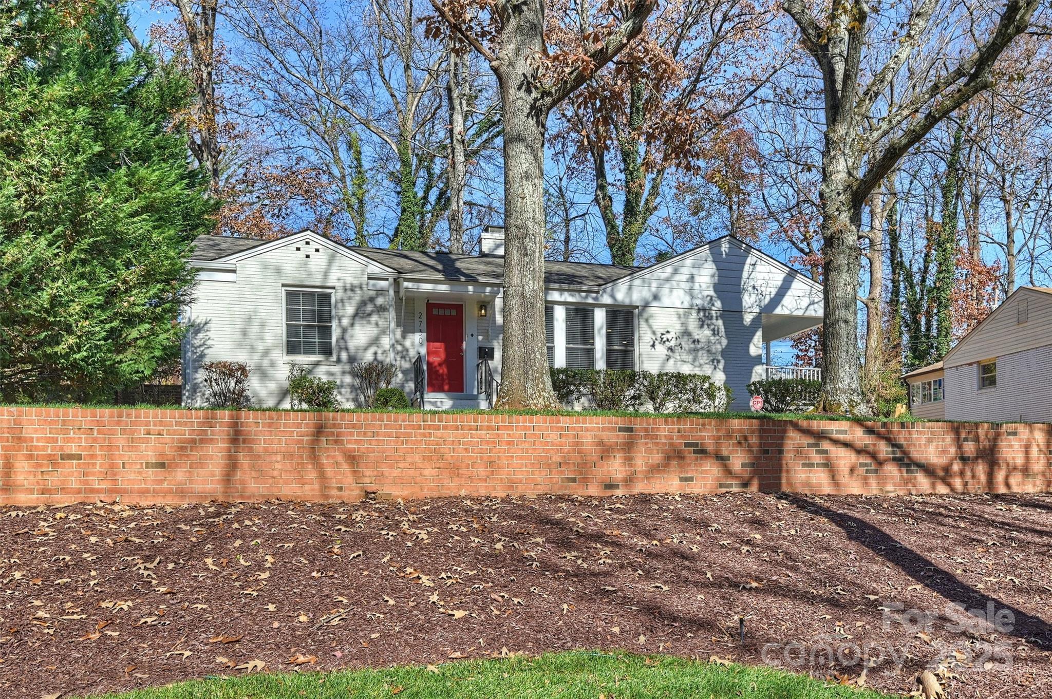 2730 Royston Road Charlotte, NC 28208 - Photo 3 of 40 a view of a house with a yard