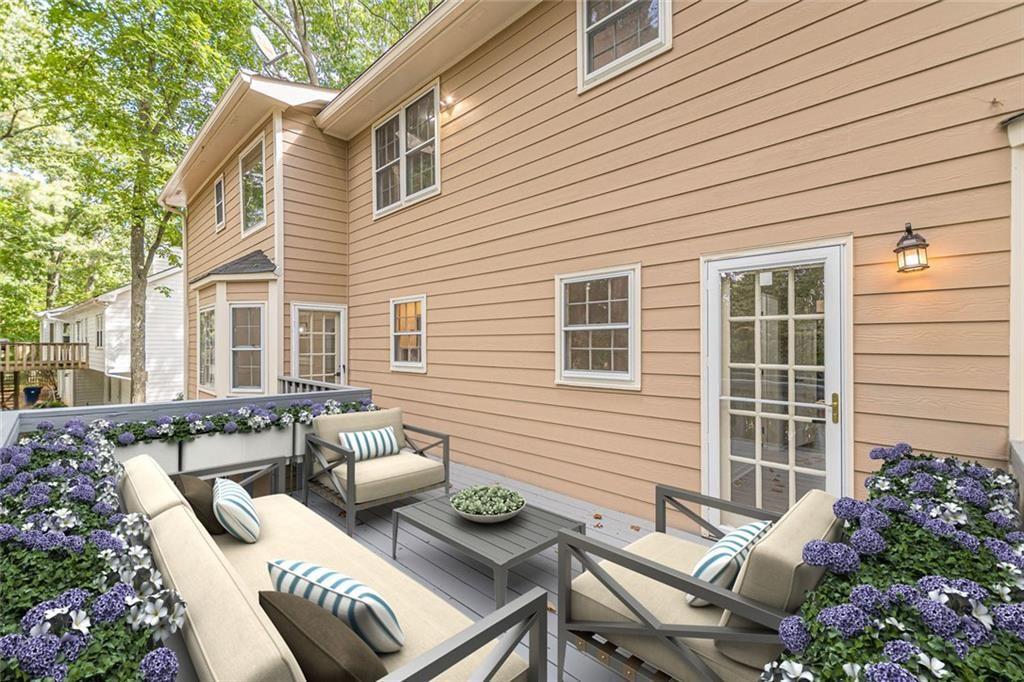 2011 Old Peachtree Road Northwest Duluth, GA 30097 - Photo 33 of 37 a view of a patio with couches table and chairs and potted plants