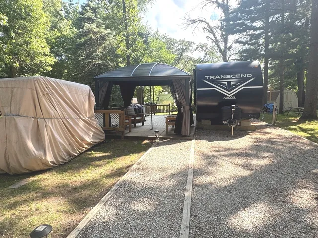 a view of a house with a yard and garage