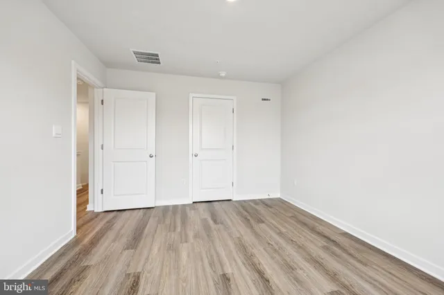 a view of small space with wooden floor