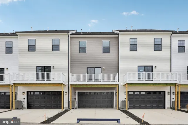 a front view of building with entrance