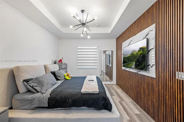 a living room with lots of clothes and shoes