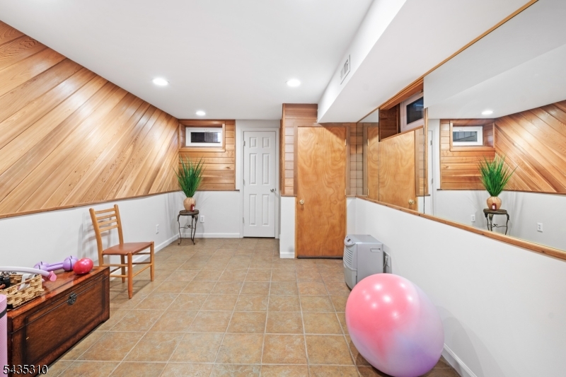 488 Auten Road, Unit 2D Hillsborough, NJ 08844 - Photo 21 of 30 a bathroom with a sink and mirror with bathtub