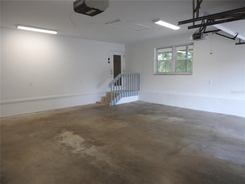 8308 Beasley Road Tampa, FL 33615 - Photo 21 of 49 en empty room with windows
