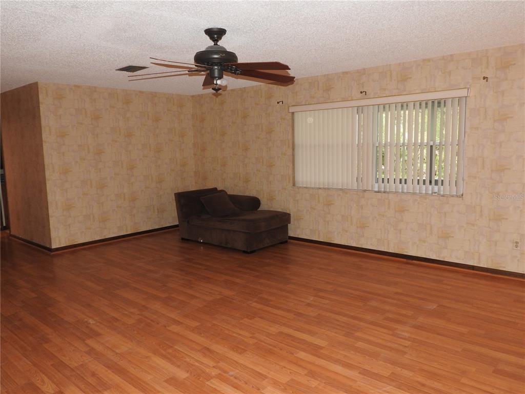 8308 Beasley Road Tampa, FL 33615 - Photo 30 of 49 a view of an empty room with a window