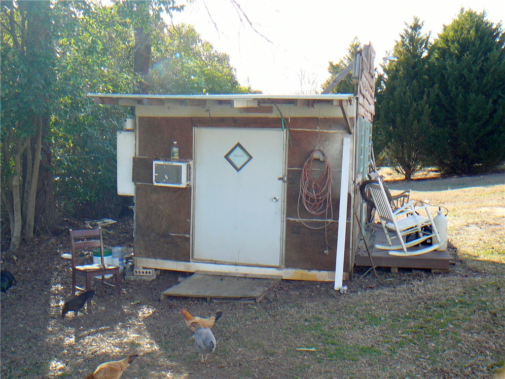2 Sirrine Street Honea Path, SC 29654 - Photo 4 of 10 This outdoor structure offers a functional space, perfect for various utility needs.
