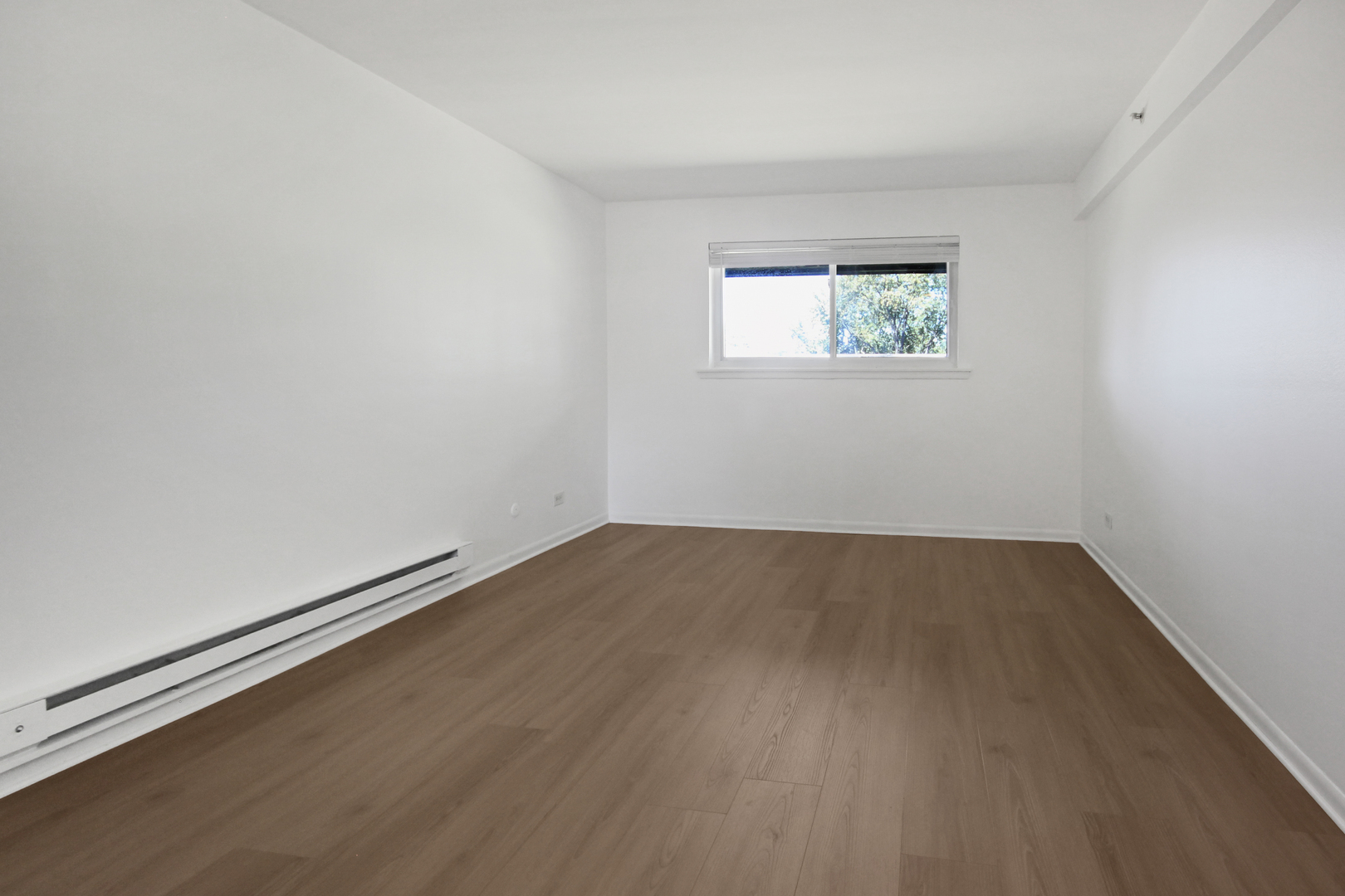 1900 Knights Bridge Drive, Unit 2B Mount Prospect, IL 60056 - Photo 12 of 16 an empty room with a workbench