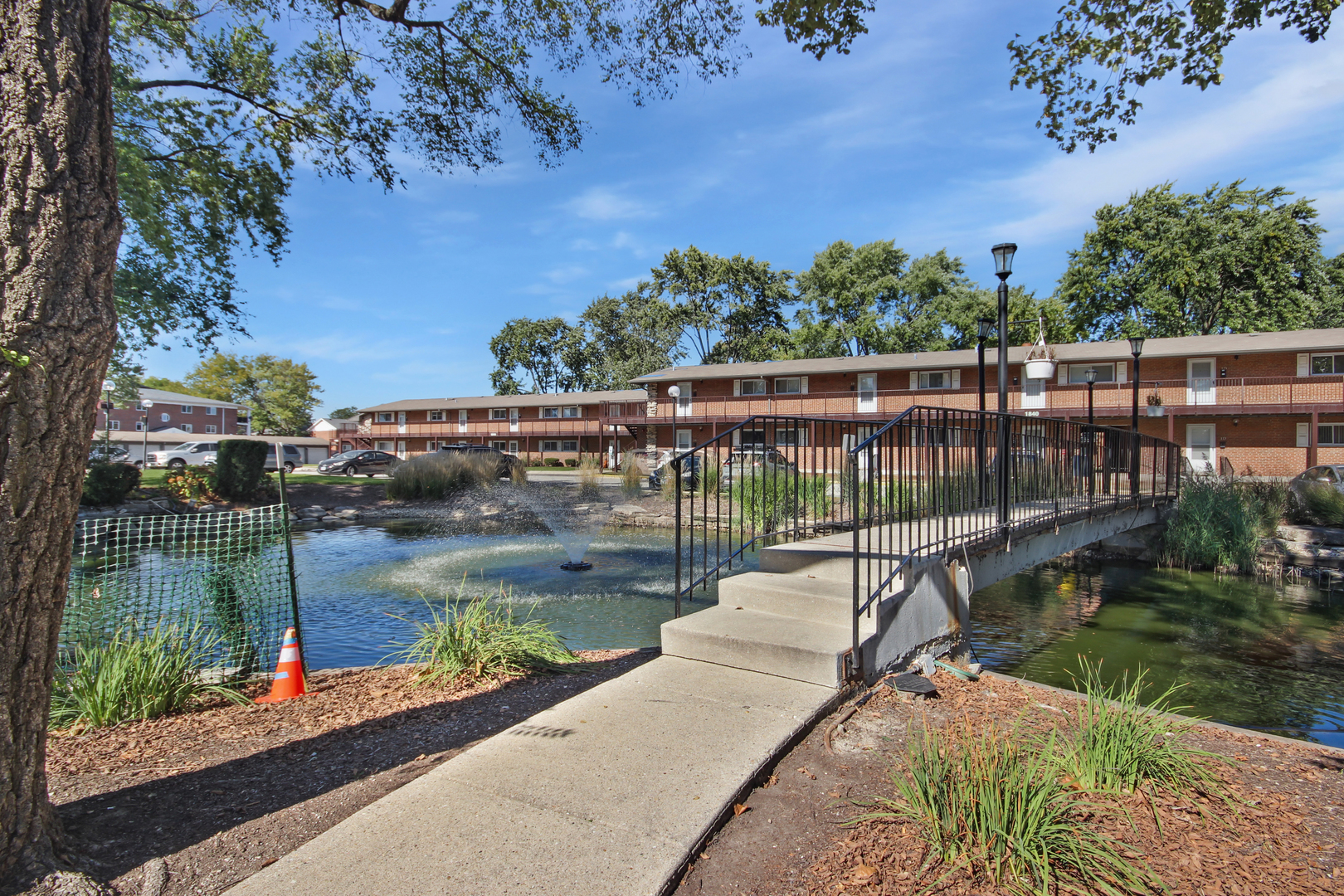 1900 Knights Bridge Drive, Unit 2B Mount Prospect, IL 60056 - Photo 6 of 16 a view of a lake from a balcony