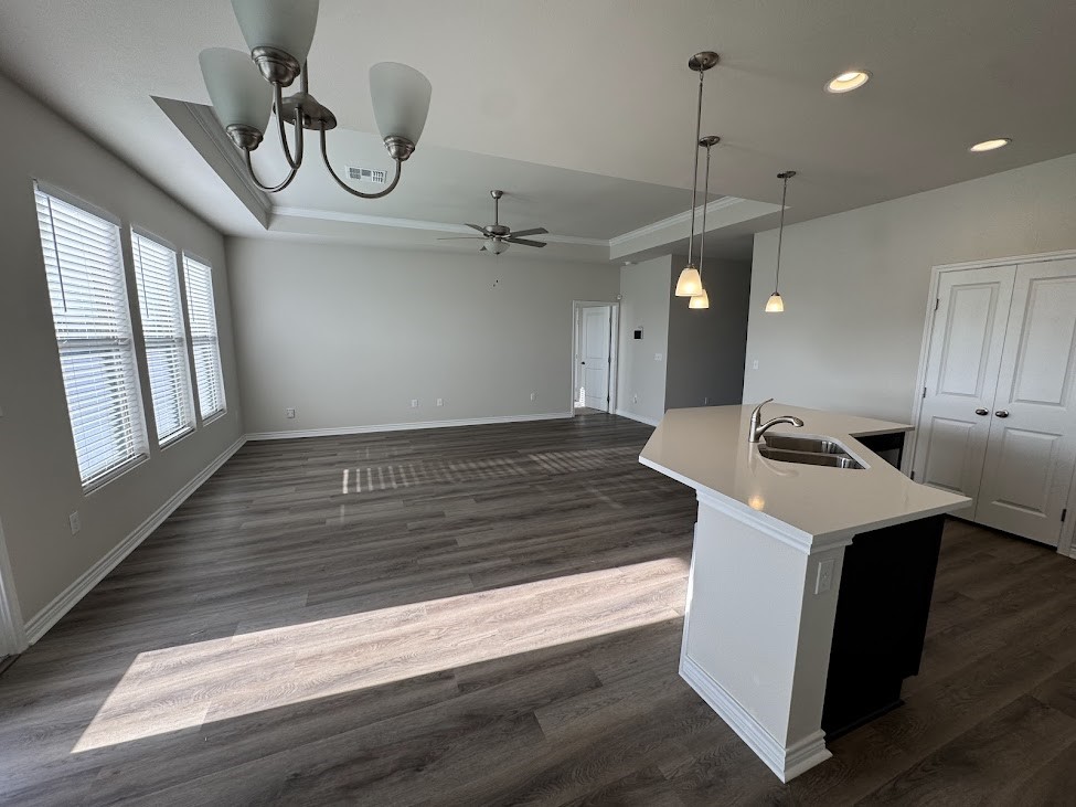 2658 Westeros Street Corpus Christi, TX 78415 - Photo 5 of 13 a view of counter top space with furniture and wooden floor